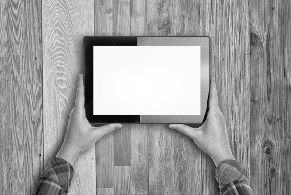 digital device on top of wooden floor