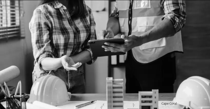 contractors holding tablet Cape Coral